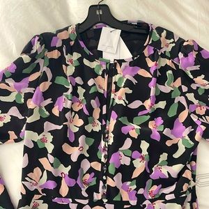 Brand new never used Equipment dress. Size 12. Beautiful and vibrant colors.